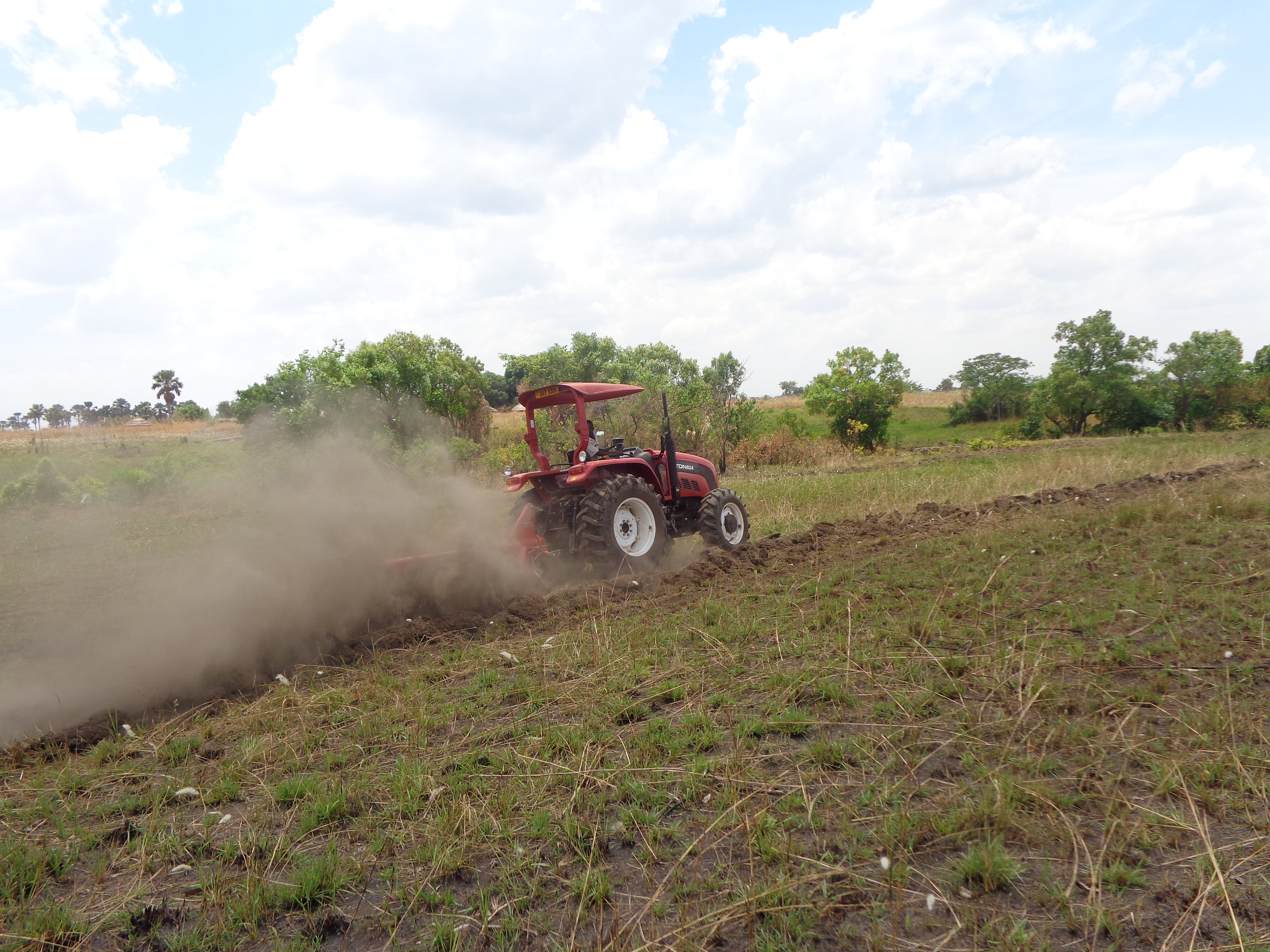 A tractor ploughing a farmers feild
