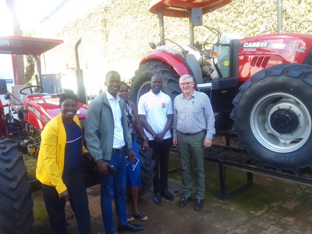 NUTOFA SACCO members with red CASE-IH 110 JX tractors